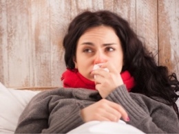 sick_woman_in_bed-260x195